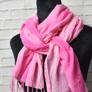 Hand painted pink scarf on a mannequin.